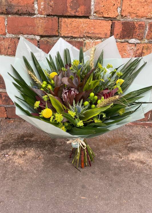 This modern foliage bouquet for men by Make Their Day Florist is unique, stands apart from the crowd, the perfect long lasting gift, bursting with texture, sumptuous greenery and pops of colour.