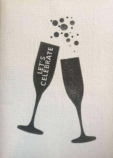 Let's Celebrate Mono Champagne Flutes Greetings Card from Make Their Day.  Printed onto A6, high quality, recycled card.