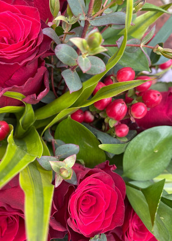 Play it old-school!  It doesn't get any more classic than the Make Their Day Florist classic dozen red roses, for men framed with mixed foliage, perfect for the perfect gentleman.