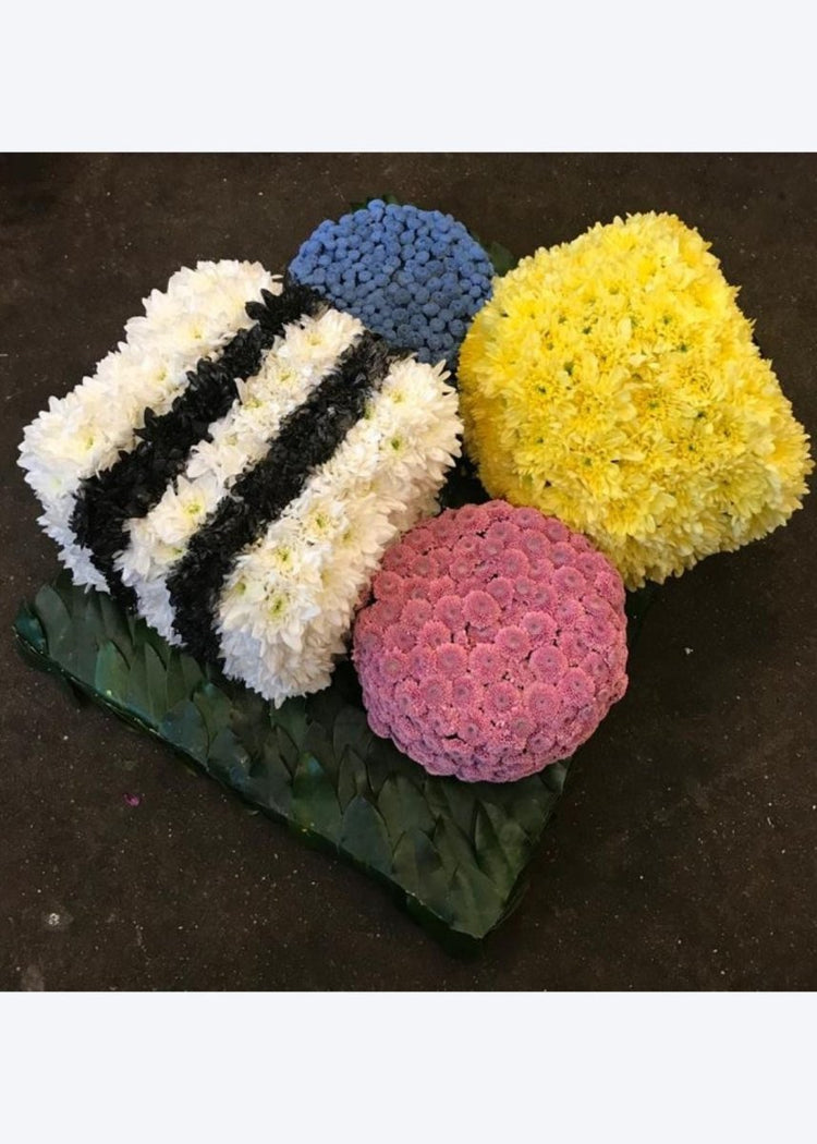 Liquorice All Sorts Funeral Tribute - Make Their Day Florist