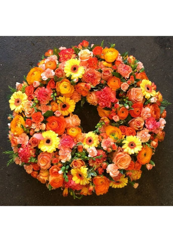 Orange and Yellow Loose Funeral Wreath - Make Their Day Florist