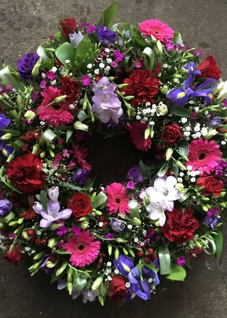 Red, Pink and Purple Loose Funeral Wreath - Make Their Day Florist